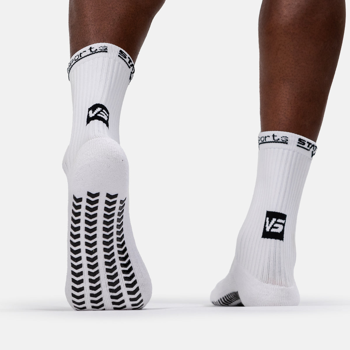 White STATSports Training Grip Socks from the rear, showing grip pattern on the soles