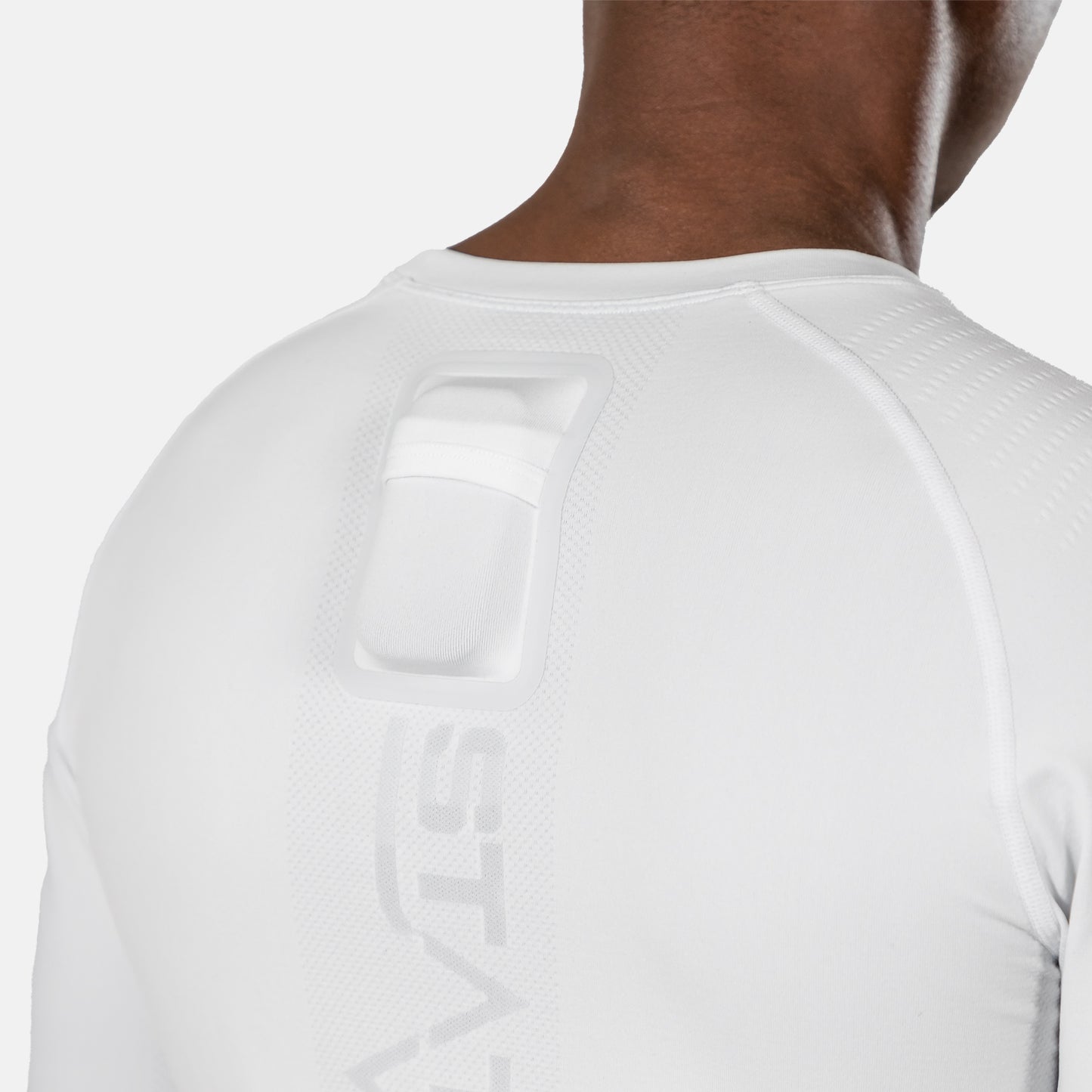 Close-up of the rear GPS pod pocket on the white STATSports long sleeve baselayer