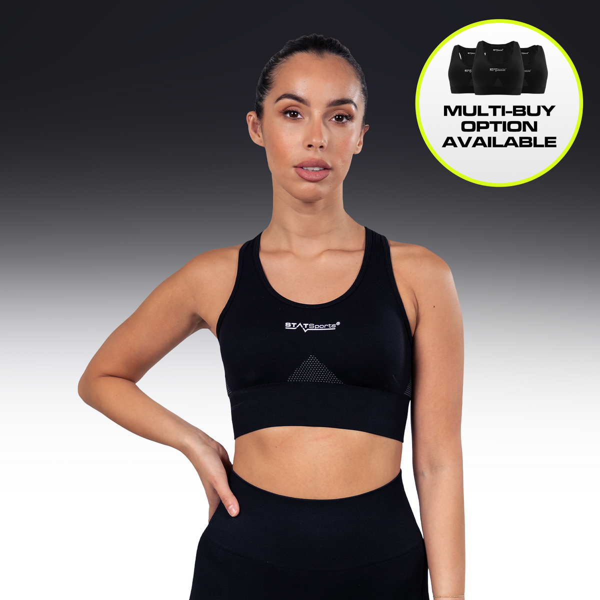 Woman wearing the black STATSports Women's Performance Sports Bra, front view
